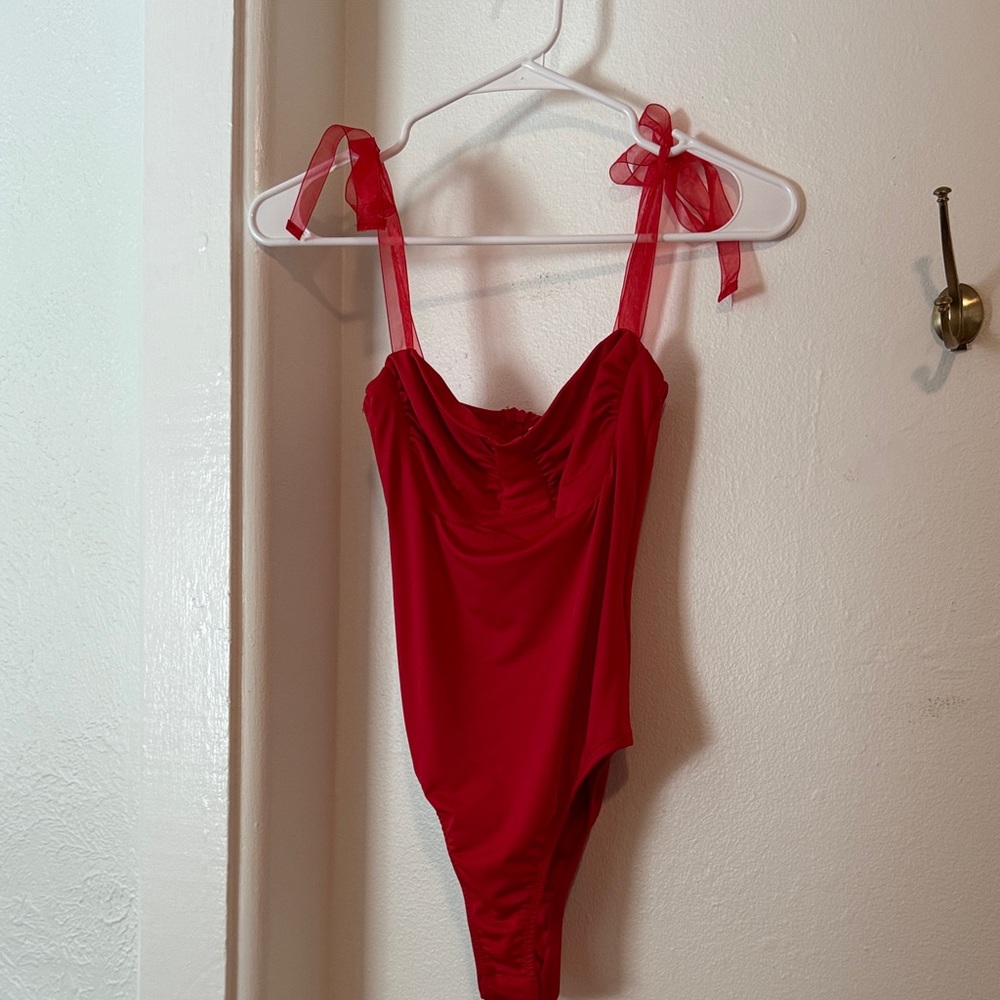 Princess Polly red zip body suit